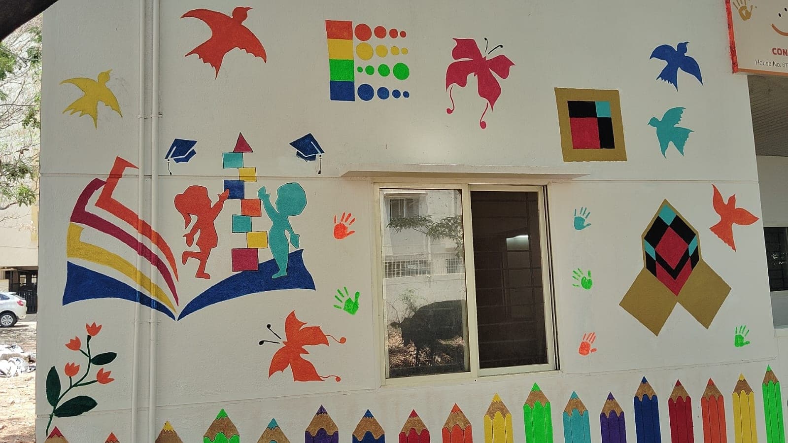 Open-book mural on the classroom wall