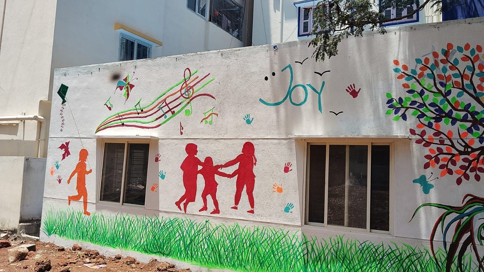 Hand-painted murals celebrating joyful learning