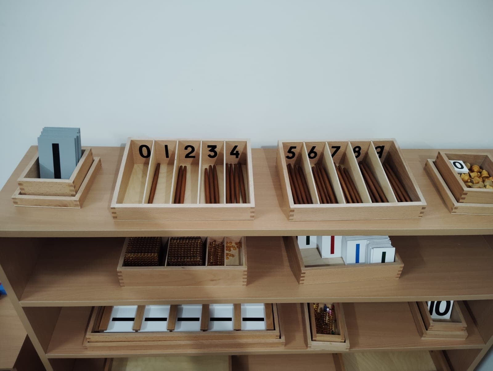 Montessori number materials arranged at child height