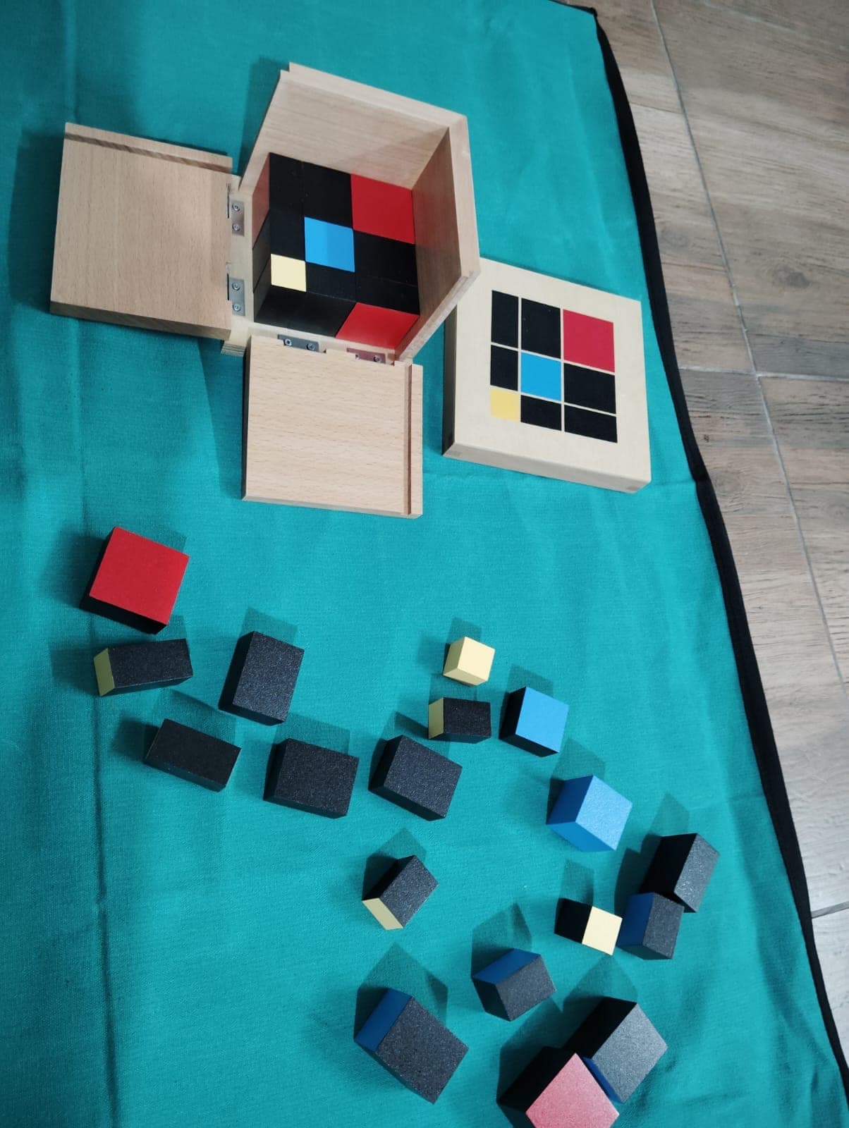 The binomial cube on a work mat